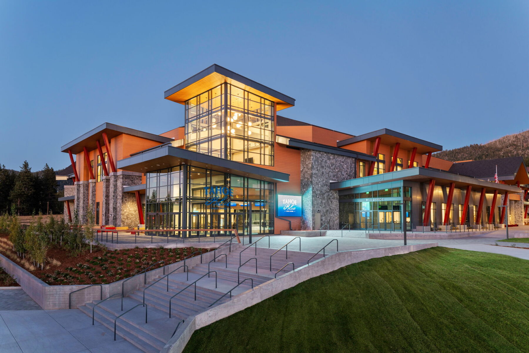 Exterior of the Tahoe Blue Event Center lit up at twilight