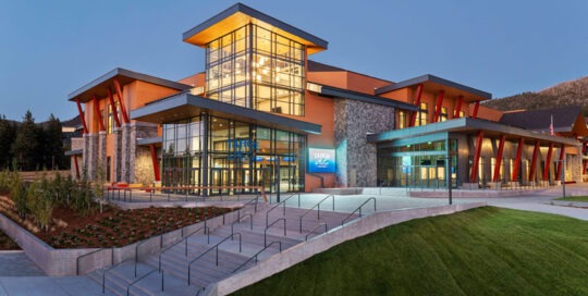 Exterior of the Tahoe Blue Event Center lit up at twilight