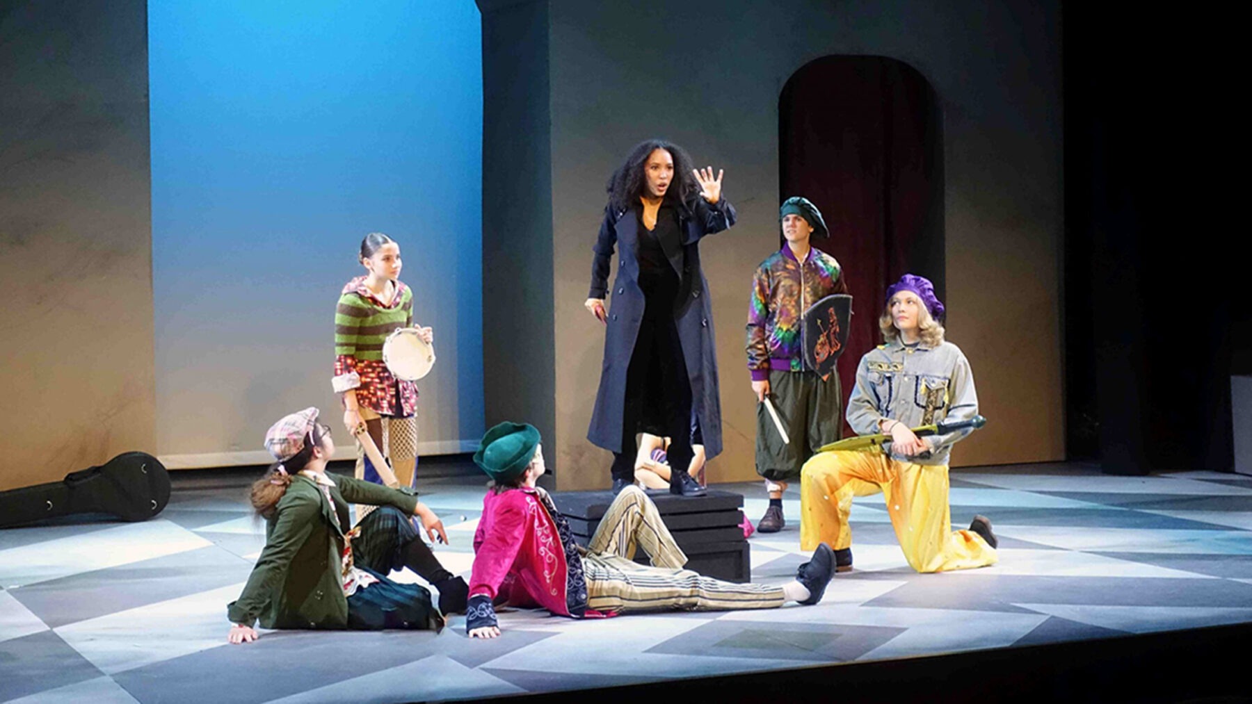 Actors on stage at the NEO Theater