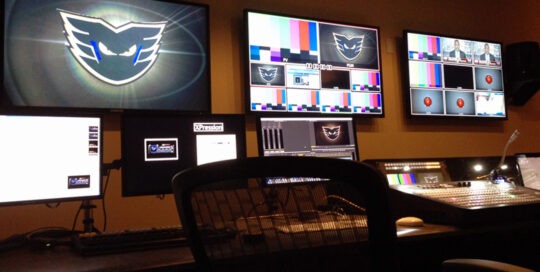 Interior of the PPL Center Control Room, with several display monitors and control boards